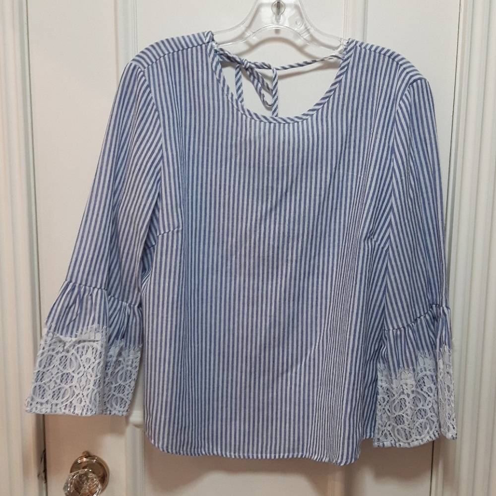 🛍️ Blue and white striped blouse